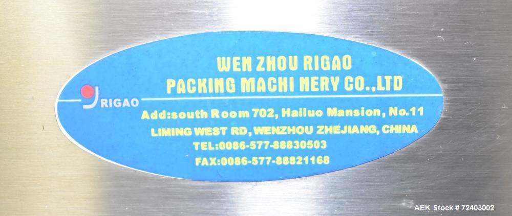 Used Wenzhou Rigao Table Top Semi Automatic Piston Filler, Model DYF. 316L Stainless steel product contact. Filling speed 5 to 20 bottles per minute. Filling accuracy /= 1% +/-. Filling range: approx...